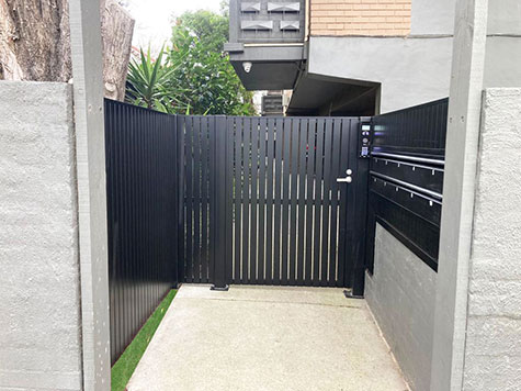 image of body corp pedestrian gate with keypad
